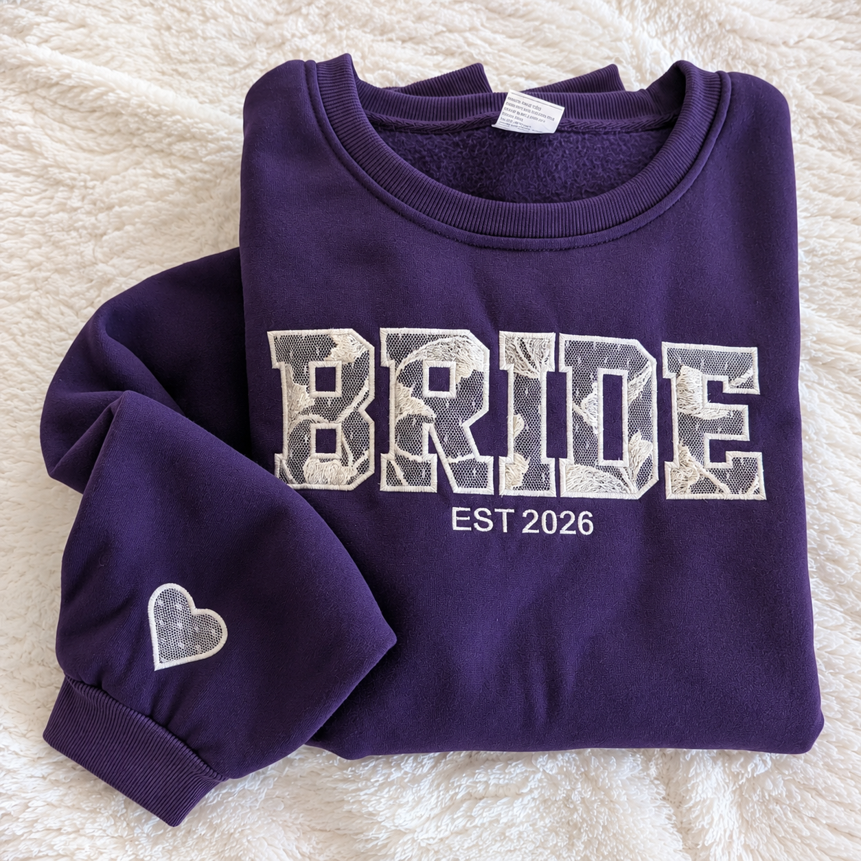 BRIDE sweatshirt appliqued with fabric from a mother’s wedding dress