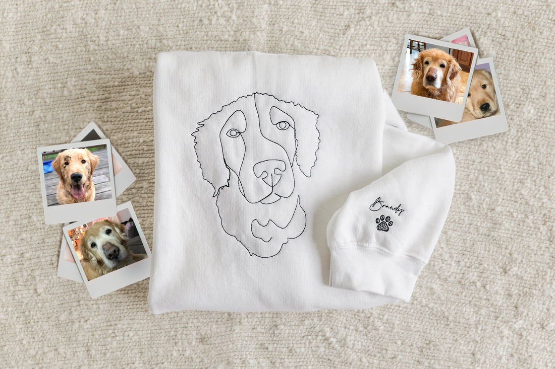 embroidered sweatshirt with a dog surrounded by photos of the dog