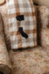 Cozy plaid blanket with a custom two-state long distance design in the corner