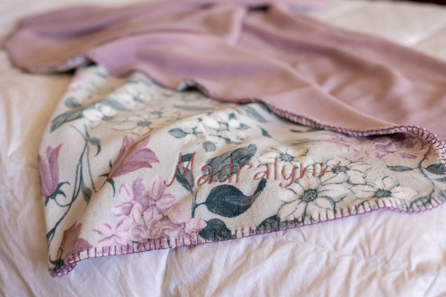 Personalized name embroidered in the corner of a soft throw blanket