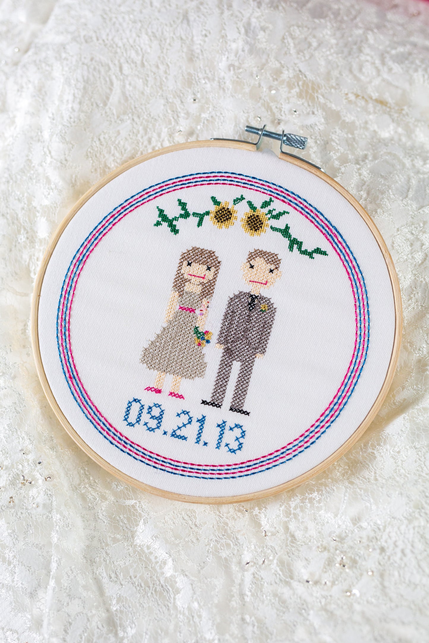 Cross stitch wedding portrait stitched from a wedding photo