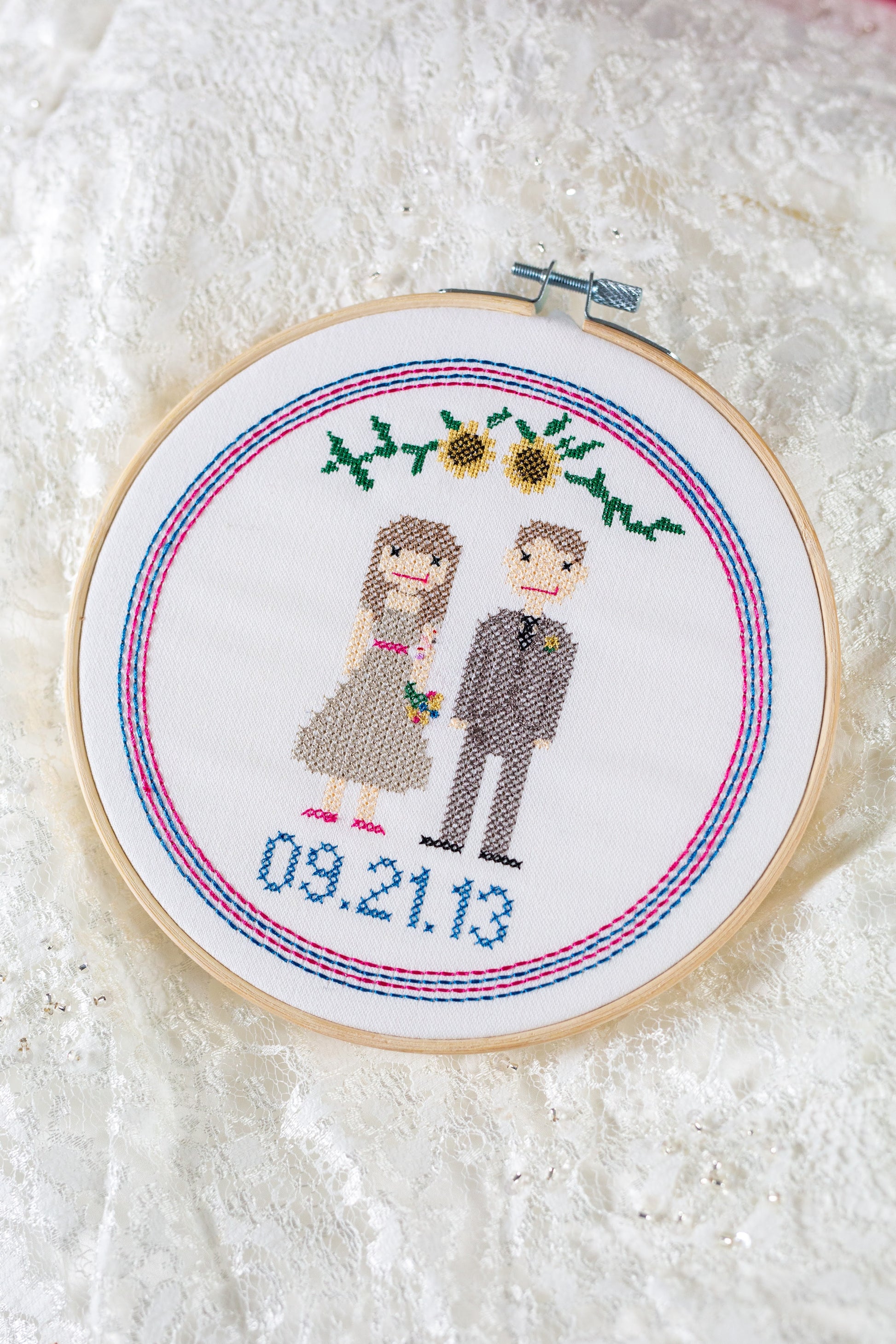 Cross stitch wedding portrait stitched from a wedding photo
