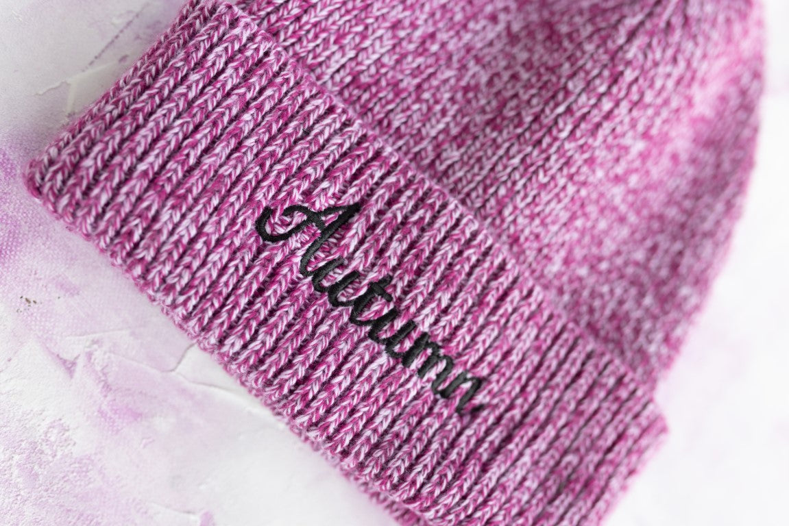 Custom name beanie embroidered in a cursive font