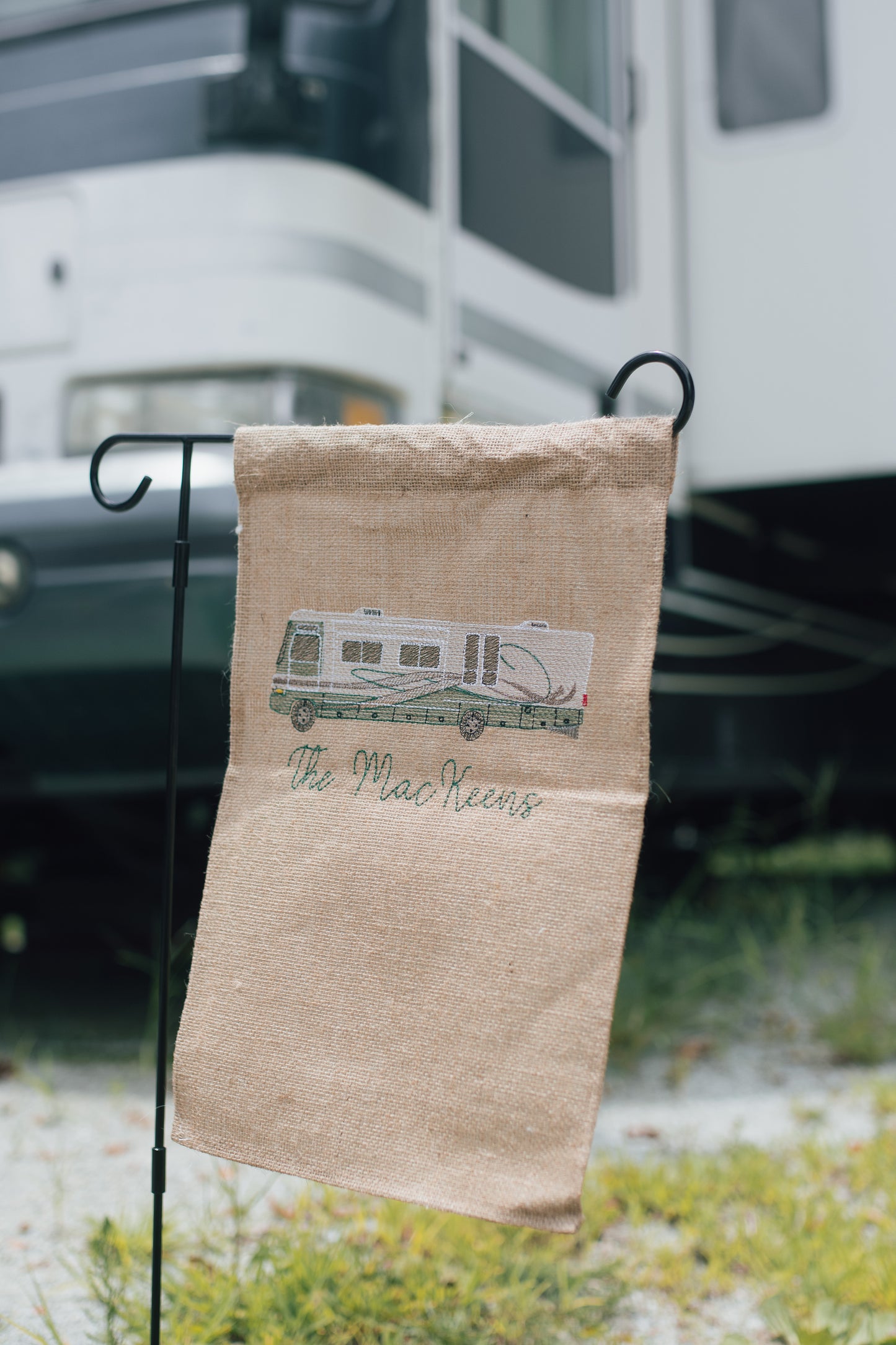 Custom embroidered camper on a burlap garden flag