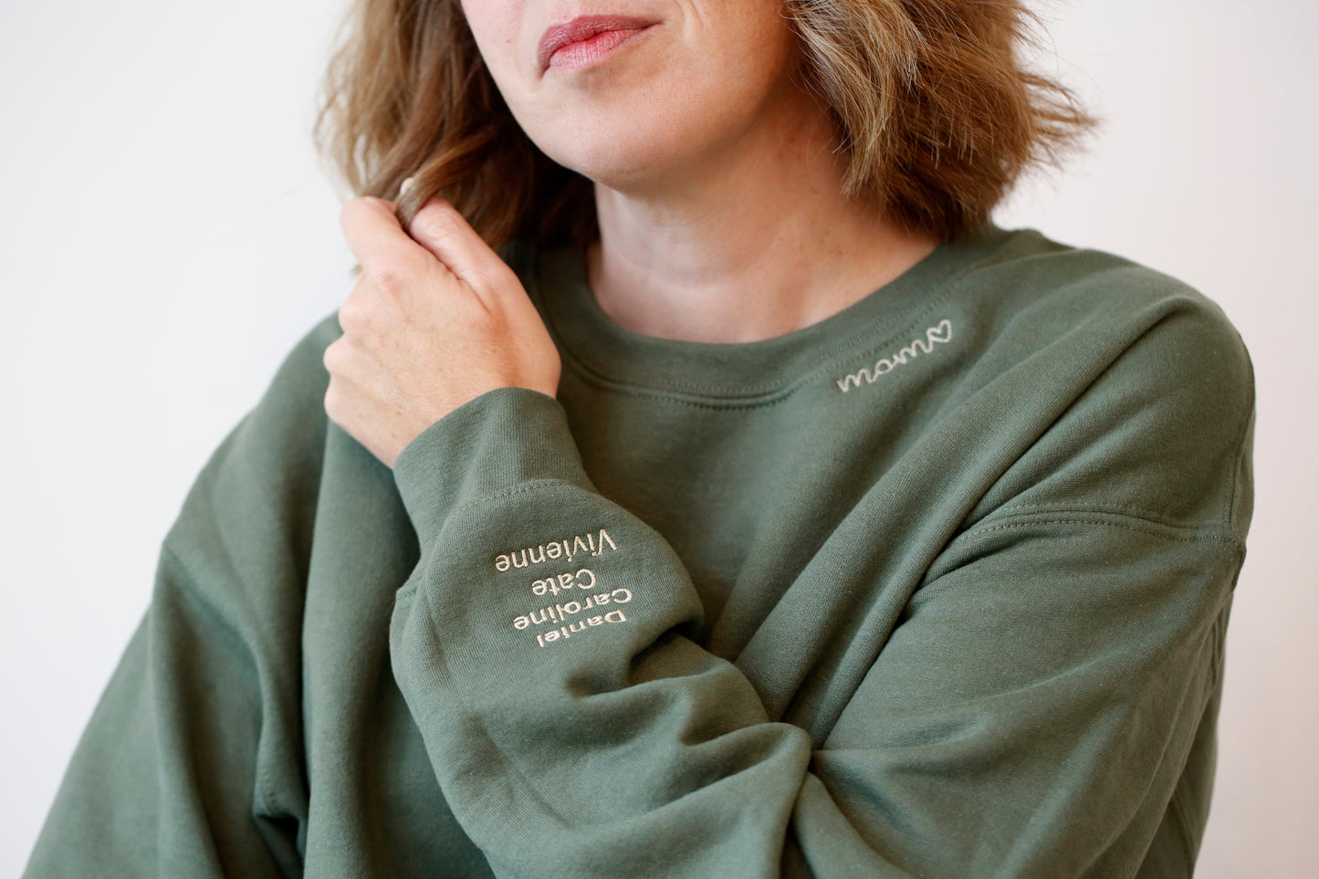 Mom collar sweatshirt with kids' names embroidered on the sleeve