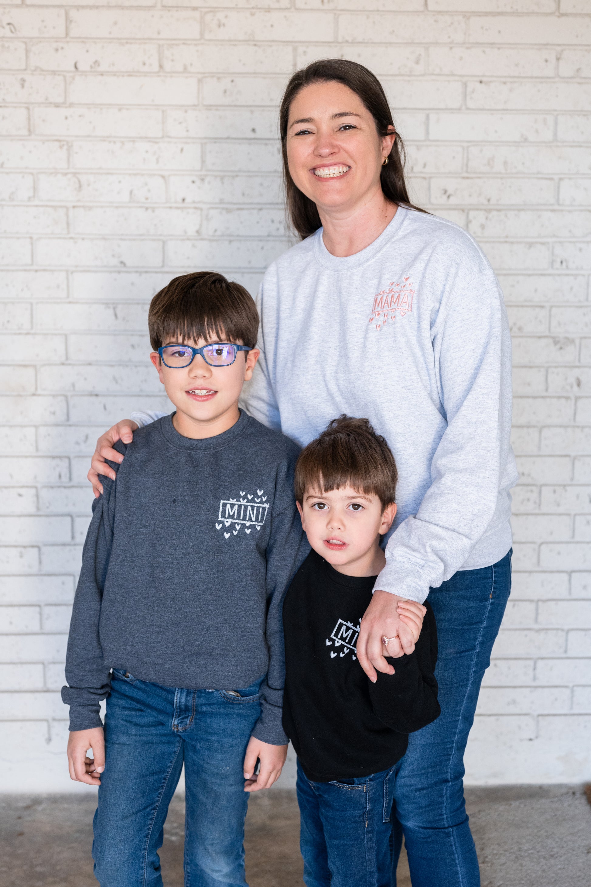 Mother and son matching Valentine's sweatshirts