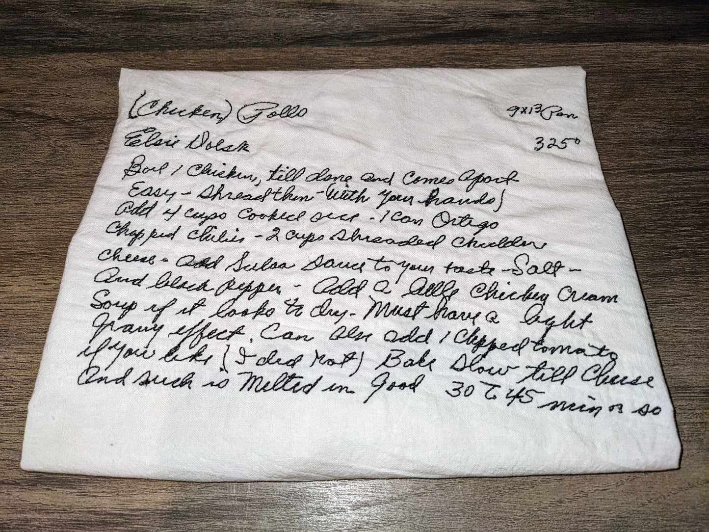 Handwritten recipe embroidered on a flour sack tea towel