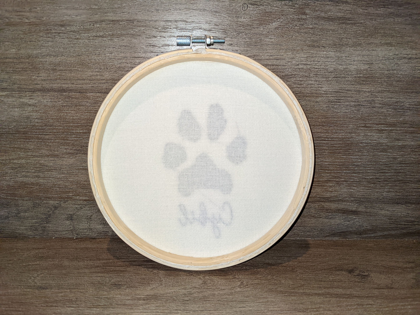 Embroidered dog paw prints with name, a pet memorial gift
