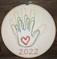 Family hands embroidered in hoop