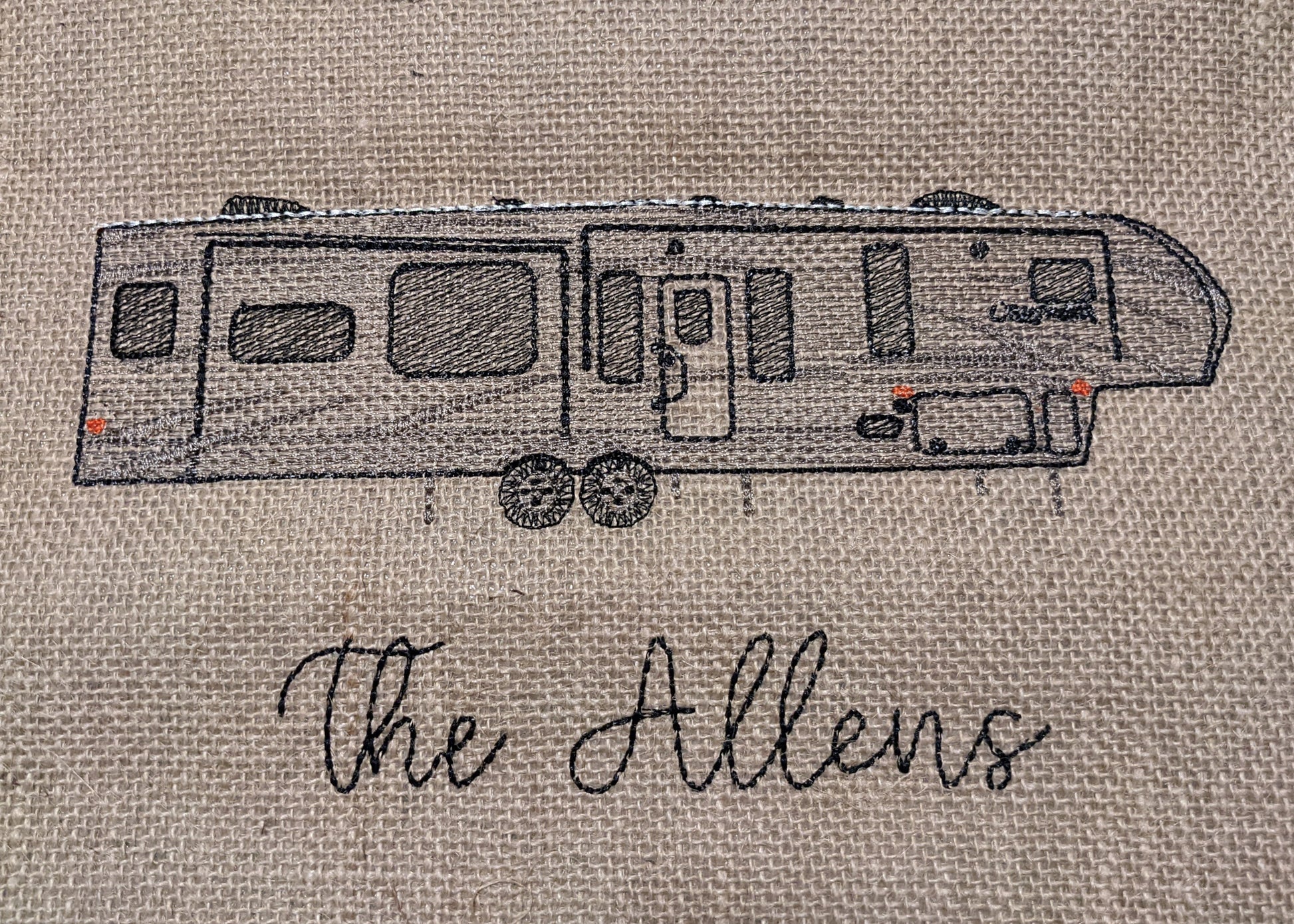 Custom trailer embroidered on a burlap garden flag