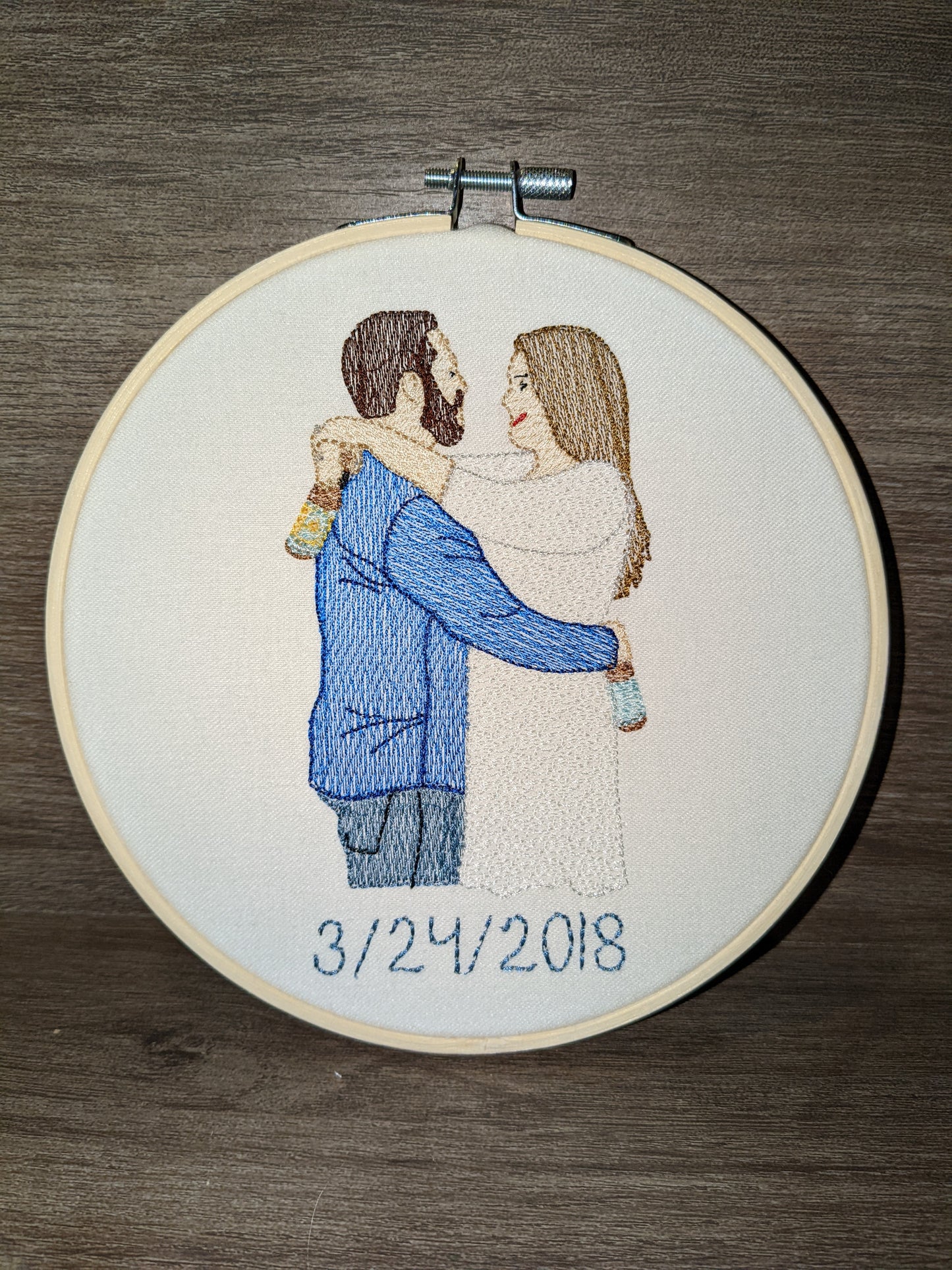 Couple embroidered in thread from a wedding photo