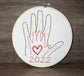 Family hands embroidered in hoop