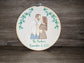 Embroidered wedding portrait in a 7 inch wooden hoop