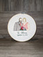 Wedding photo recreated as embroidery in a wooden hoop