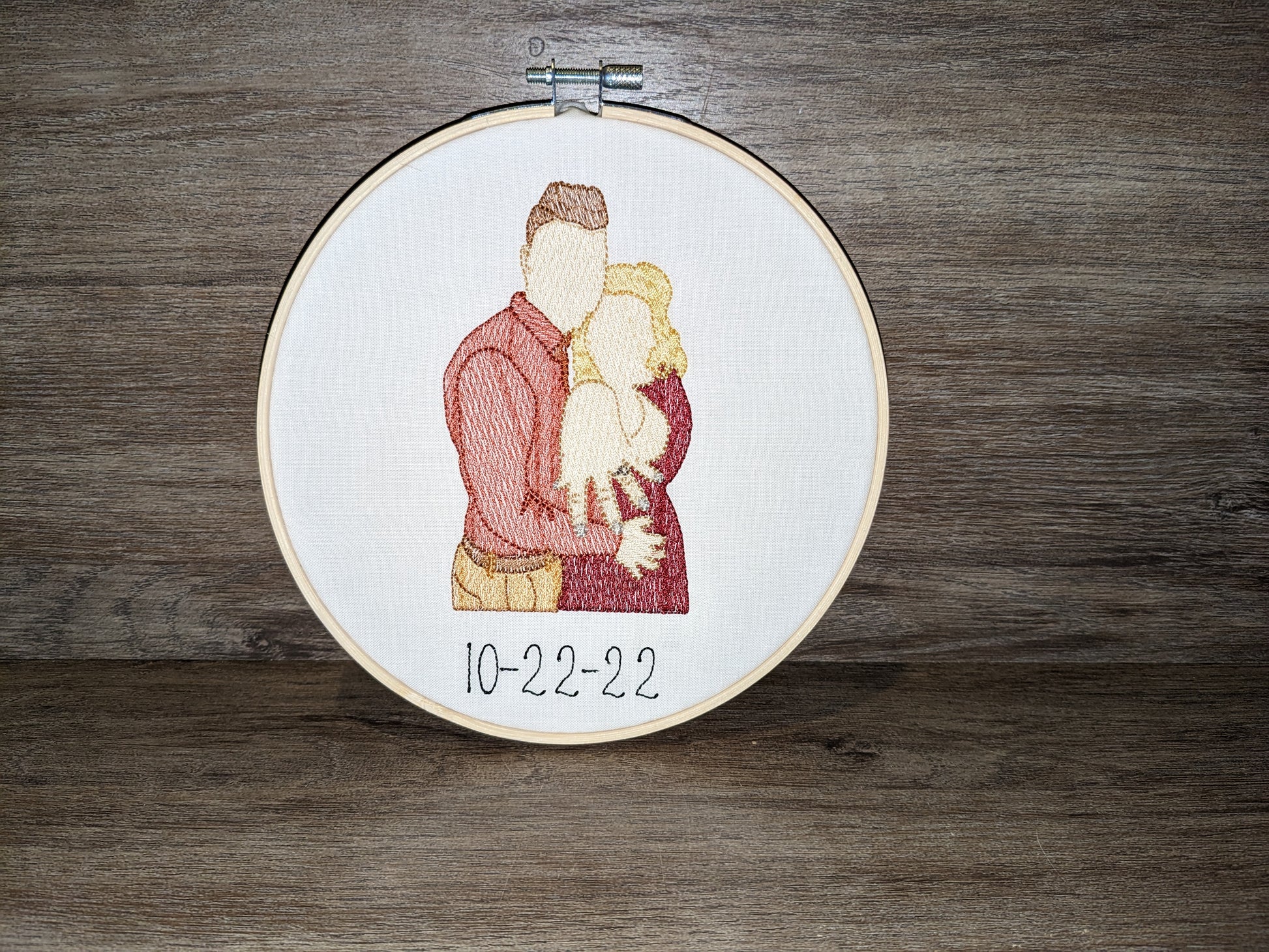 Embroidered wedding portrait in a 7 inch wooden hoop