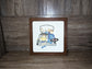 Embroidered wedding portrait in a 7 inch wooden hoop