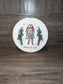 Wedding couple embroidered from a photo in an embroidery hoop