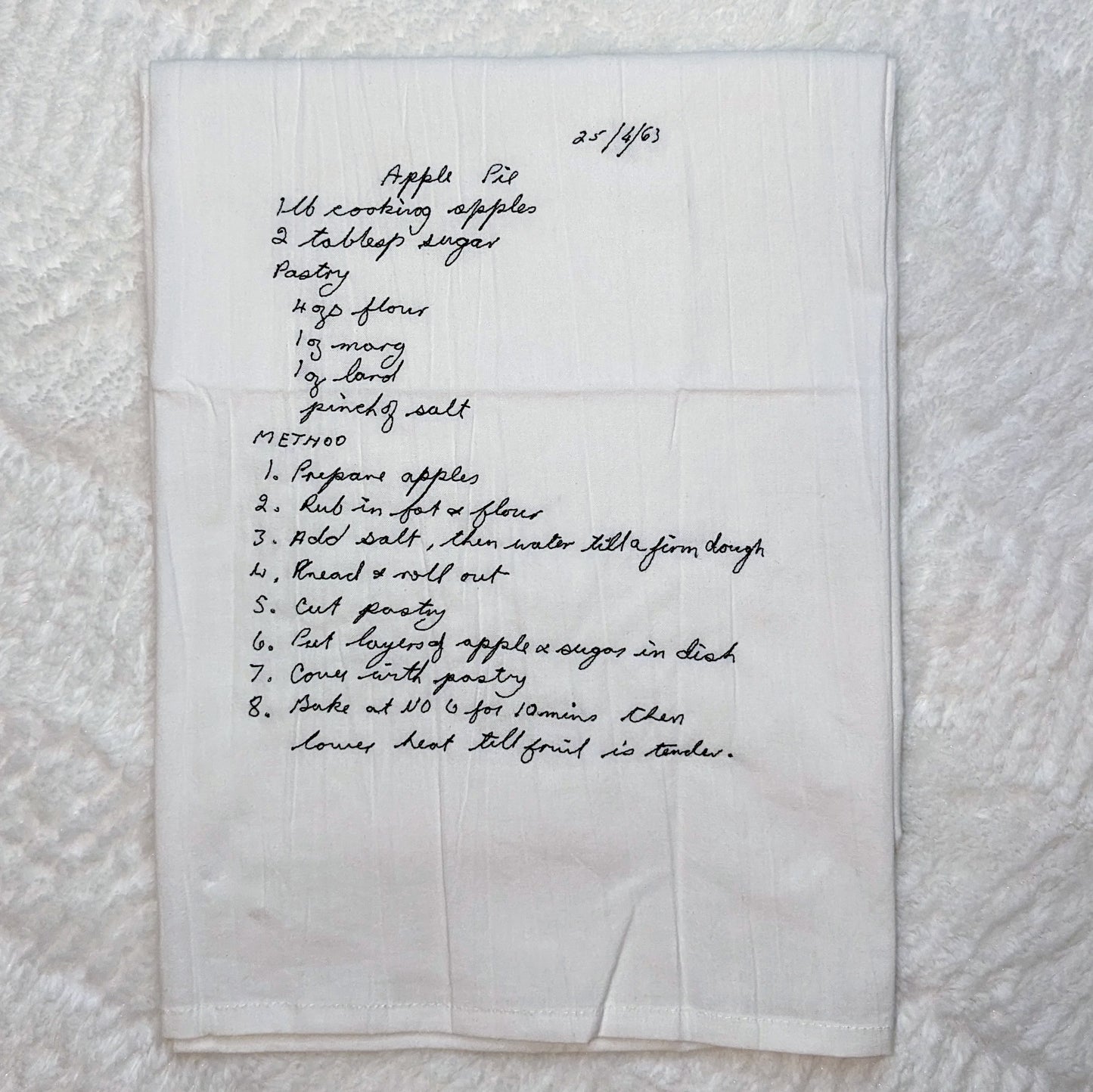 Grandma's handwritten recipe embroidered on a tea towel