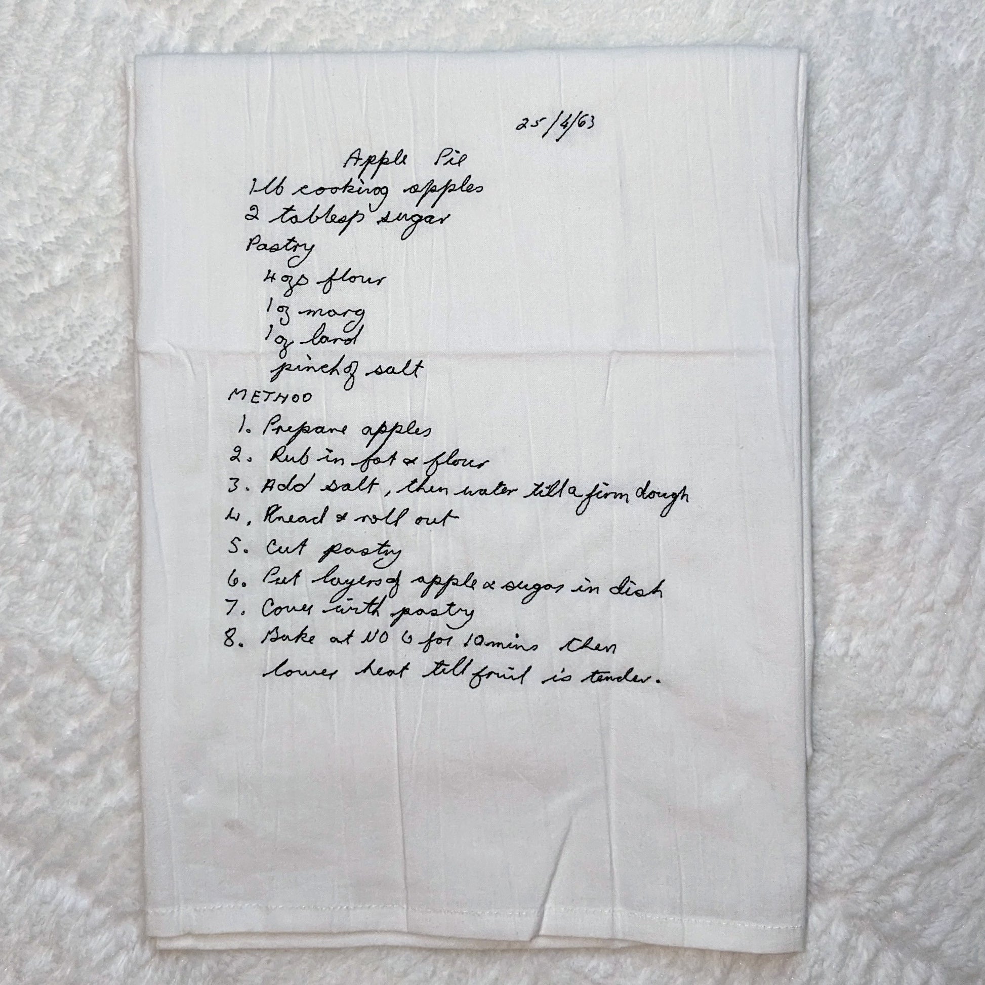 Grandma's handwritten recipe embroidered on a tea towel