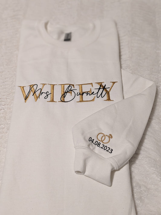 Wifey sweatshirt with Mrs. and last name embroidered on the chest