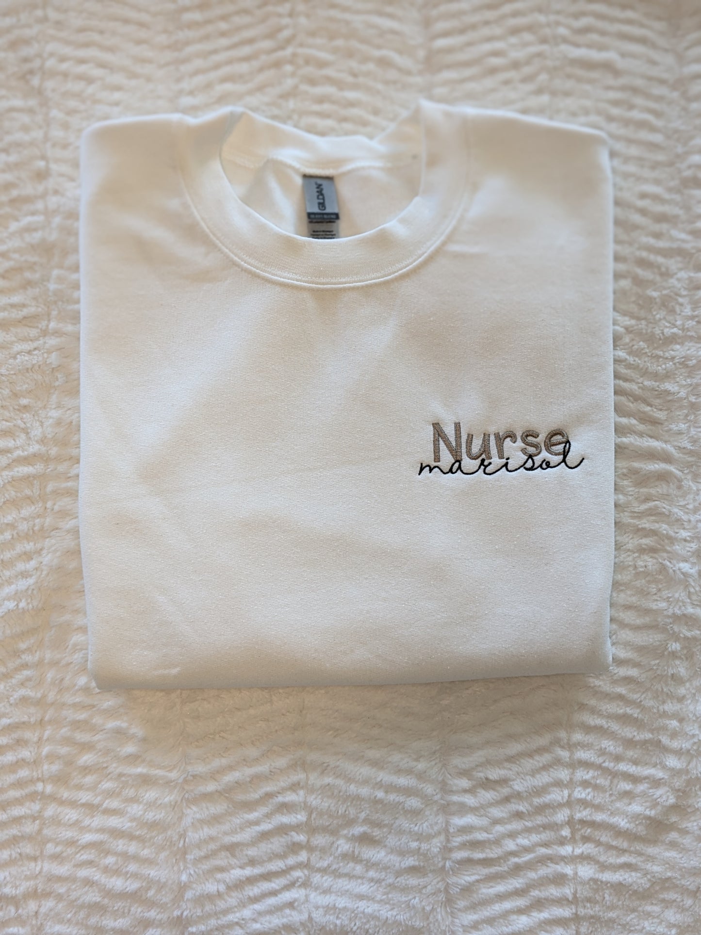 Occupation sweatshirt with nurse and a name embroidered on the left chest