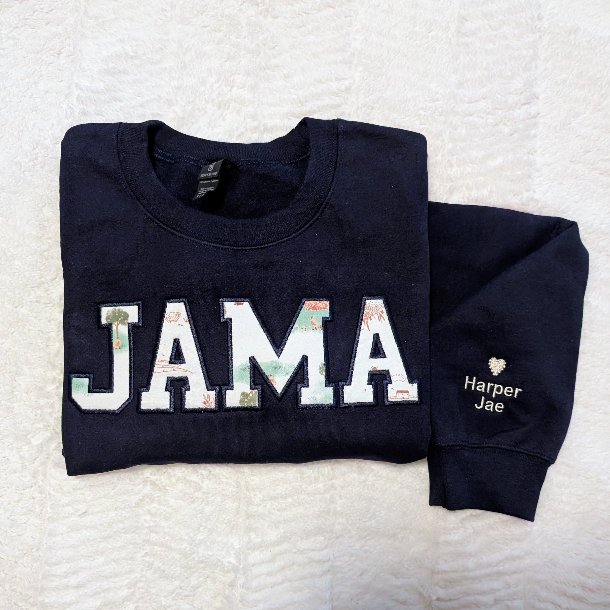 JAMA keepsake sweatshirt made from baby blankets with kids names on the sleeve