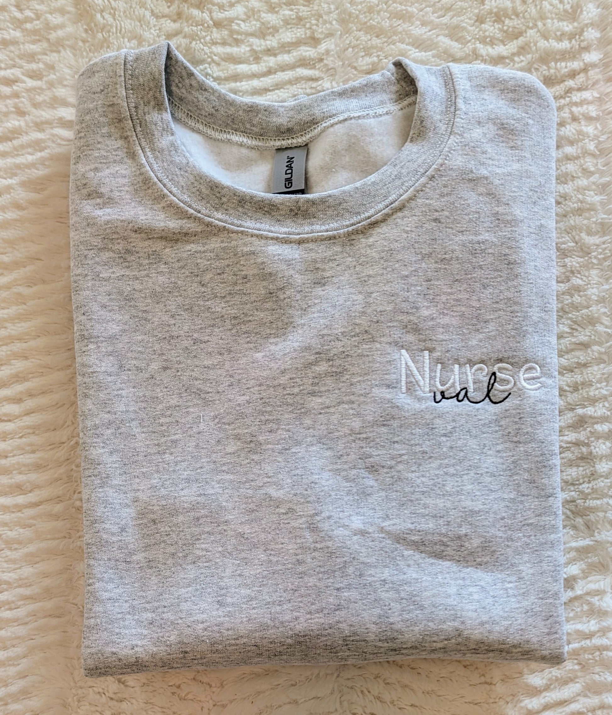 Personalized nurse sweatshirt with job title and cursive name