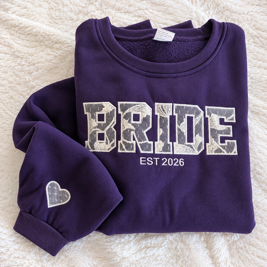 BRIDE sweatshirt appliqued with fabric from a mother’s wedding dress