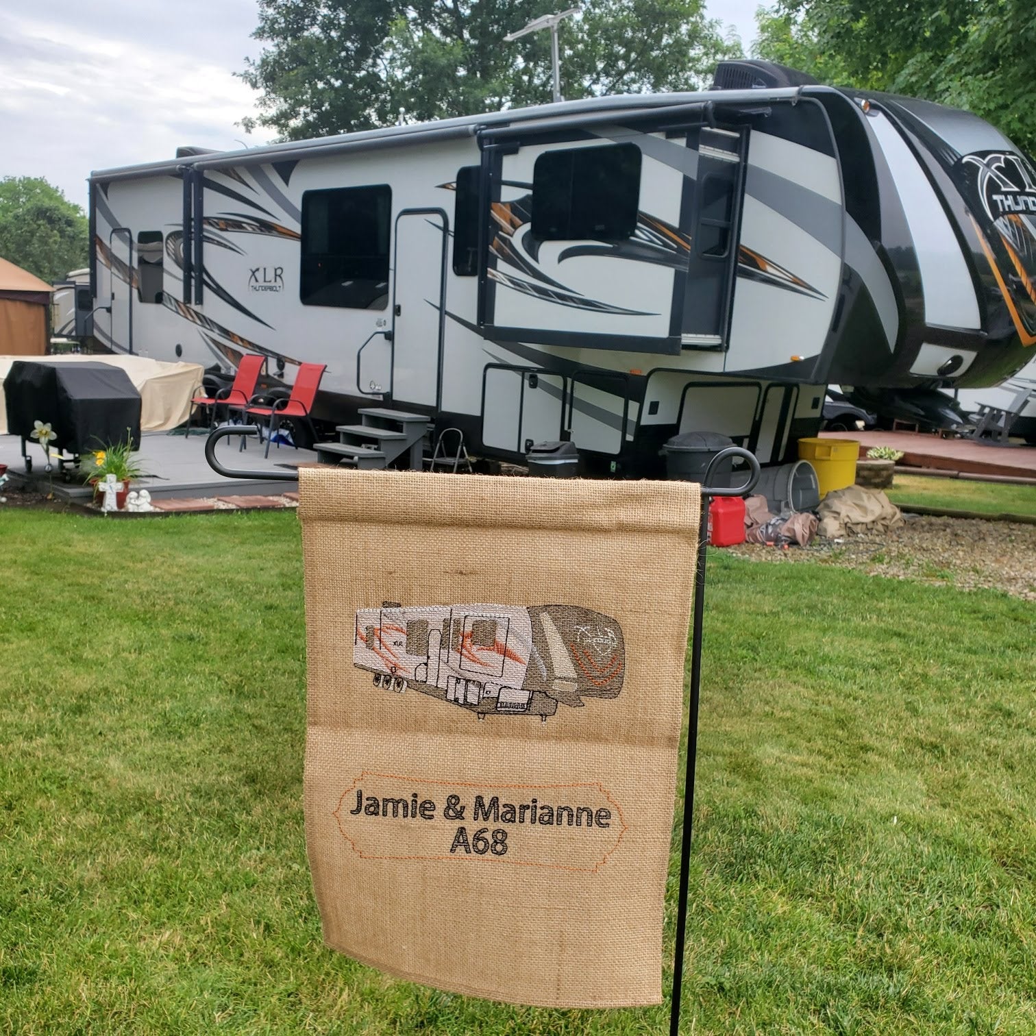 Custom embroidered camper on a burlap garden flag