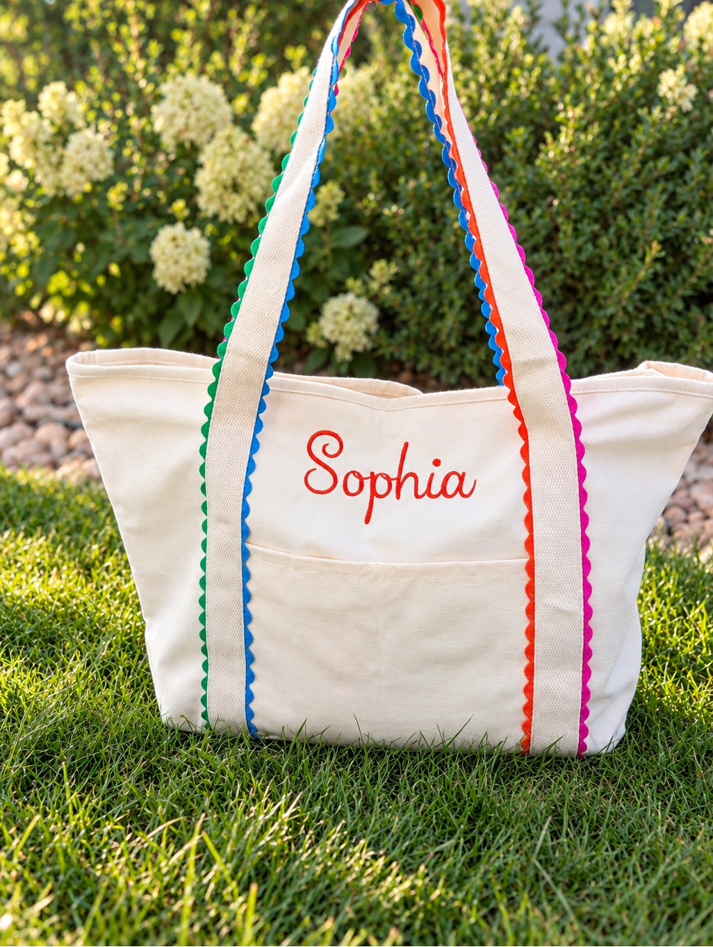 Canvas zipper tote bag with rainbow ricrac trim and embroidered name