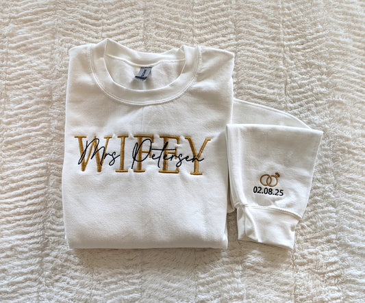 Personalized Wifey crewneck with wedding rings and date on the sleeve